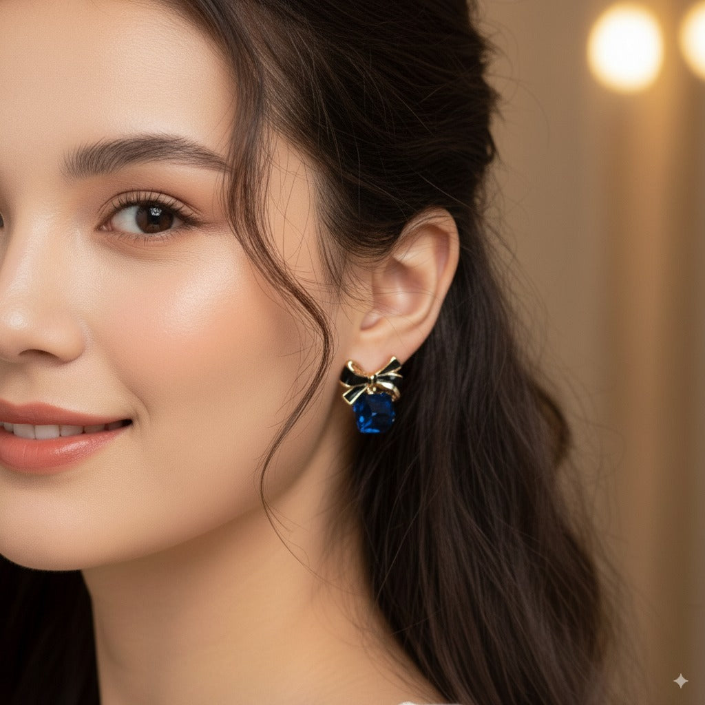 Sparklings Royal Blue Crystal Bow Earrings – Stylish Gold Plated Studs for Modern Women