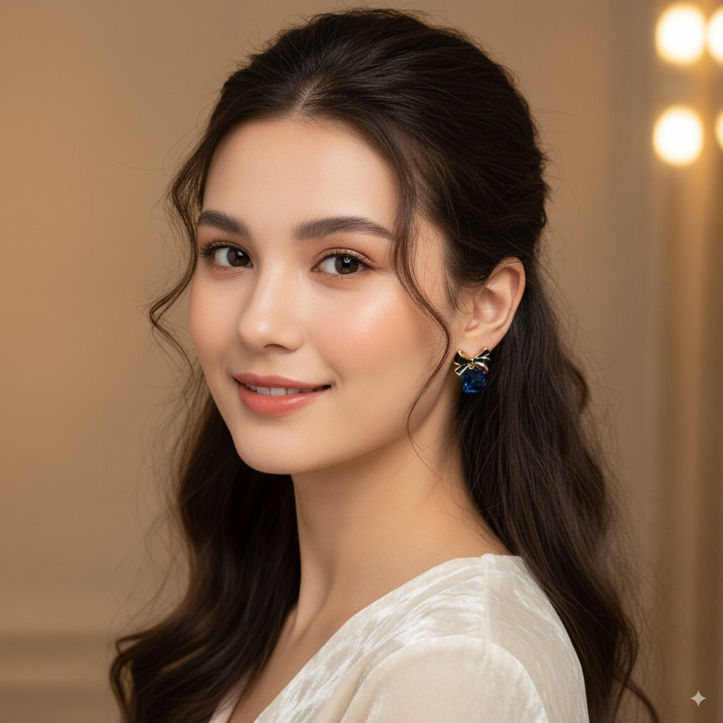Sparklings Royal Blue Crystal Bow Earrings – Stylish Gold Plated Studs for Modern Women