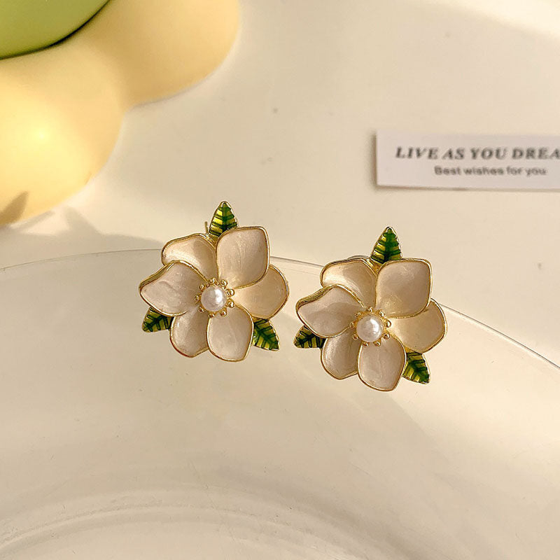 Ivory Flower Stud Earrings with Green Leaf Accents – Elegant & Lightweight